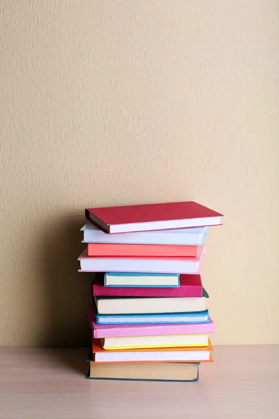 Stack of books on shelf. — Stock Photo, Image