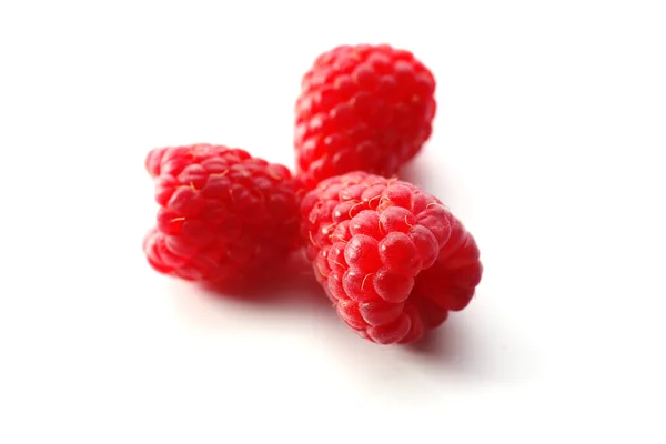 Red sweet raspberries isolated on white — Stock Photo, Image