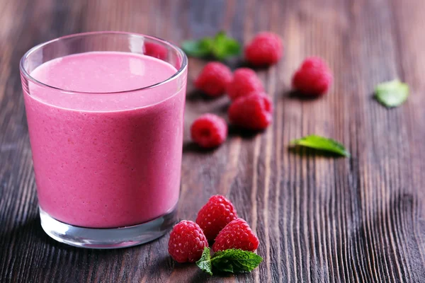 Glass of raspberry milk shake — Stock Photo, Image