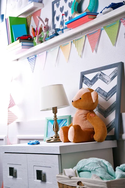 Shelves with toys in child room close-up — Stock Photo, Image