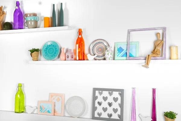 Wooden shelves with decorative things — Stock Photo, Image