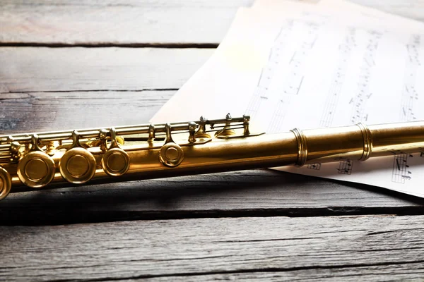 Silver flute with music notes — Stock Photo, Image