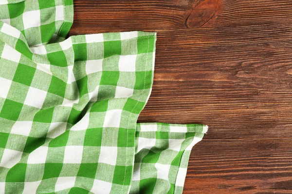 Napkin on wooden background — Stock Photo, Image