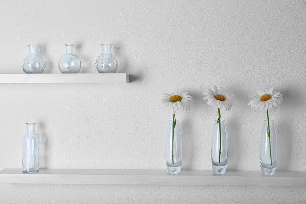 Decorative glass vases with flowers