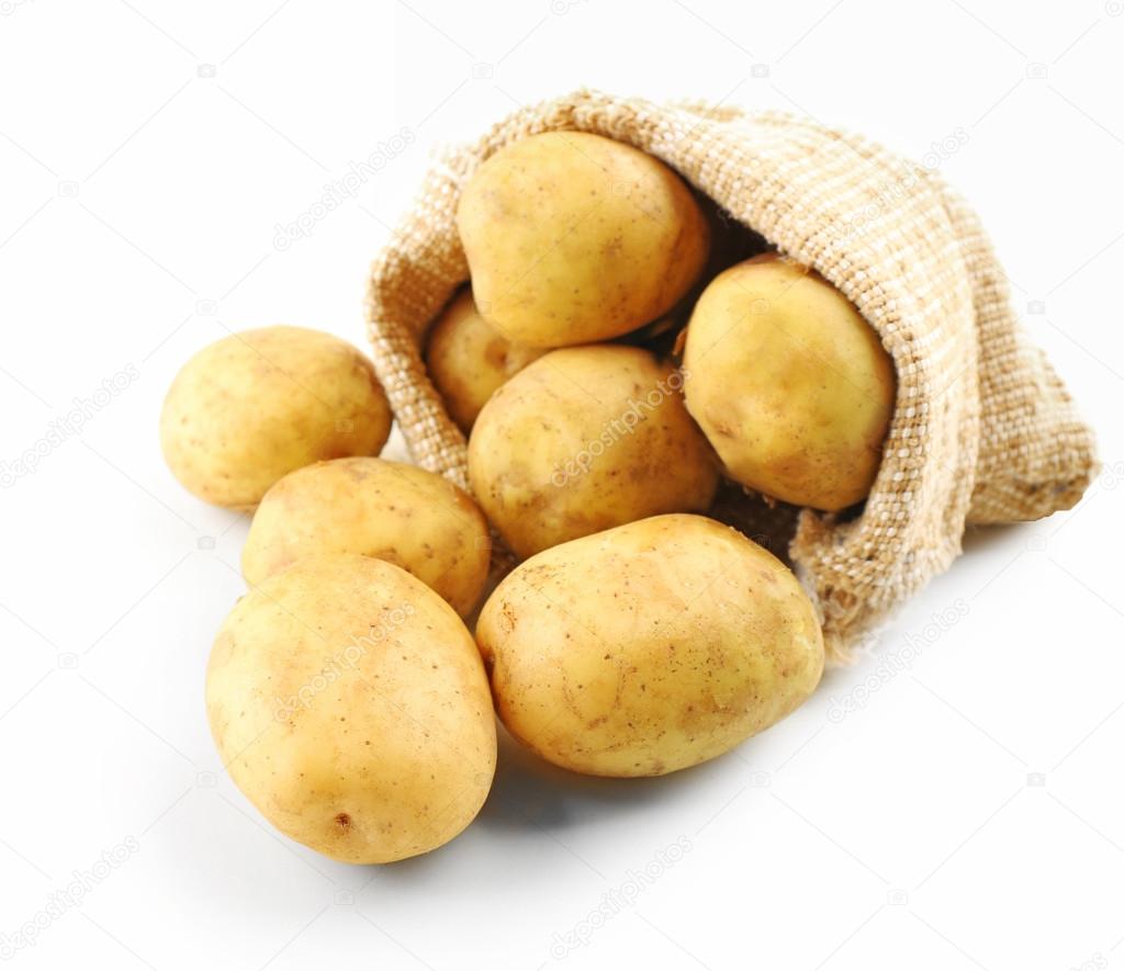 Young potatoes in sackcloth bag