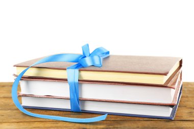 Kurdele ile kitap yığını