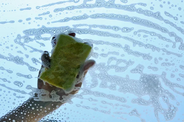 Washing window with soap and foam — Stock Photo, Image