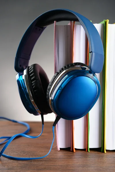 Books and headphones as audio books concept — Stock Photo, Image