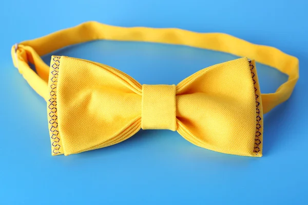 Yellow bow-tie with National emblem of Ukraine — Stock Photo, Image