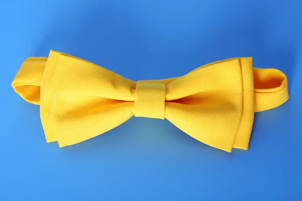 Yellow bow-tie with National emblem of Ukraine — Stock Photo, Image