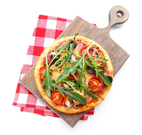 Tasty pizza with vegetables and arugula on cutting board isolated on white — Stock Photo, Image