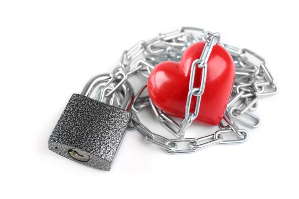 Red heart with metal chain — Stock Photo, Image