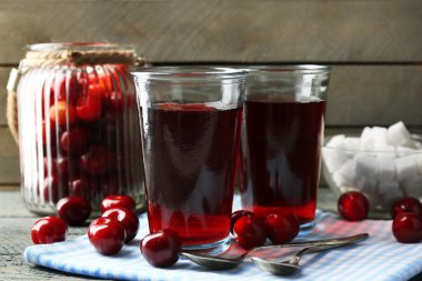 Ingredients for cherry compote on table, on light background clipart