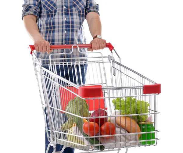 Hombre joven y carrito de compras — Foto de Stock