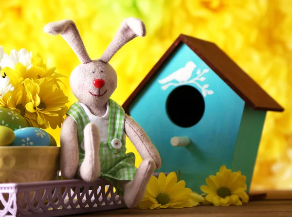 Easter bunny with painted Easter eggs — Stock Photo, Image