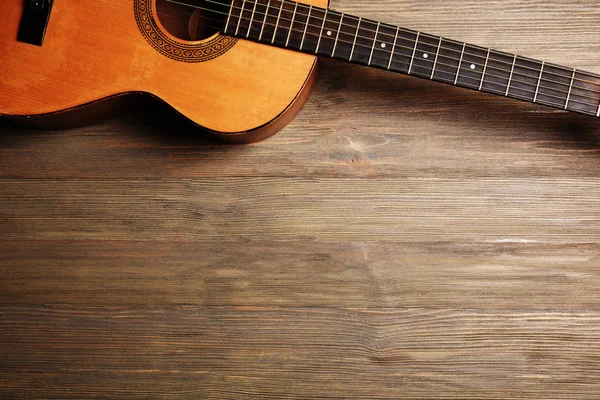 Guitarra acústica sobre fondo — Foto de Stock