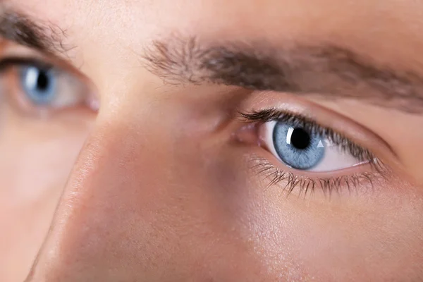 Beautiful blue man eyes