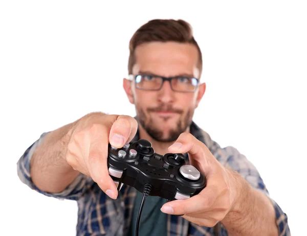 Молодой человек играет в видеоигры — стоковое фото