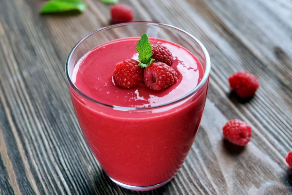 Glass of raspberry milk shake — Stock Photo, Image