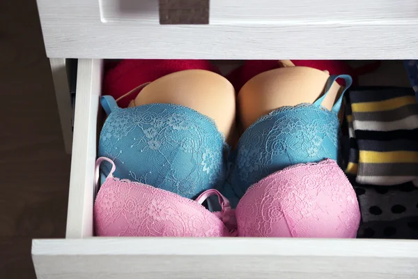 Underwear in wooden chest of drawer, close up — Stock Photo, Image