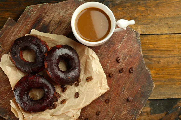 Delicious doughnuts with chocolate icing — Stock Photo, Image