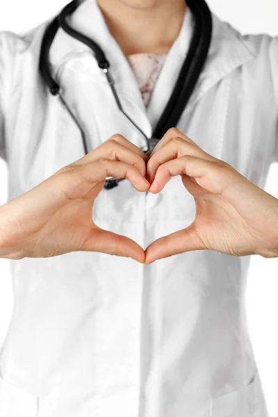 Ręce lekarza co kształt serca — Zdjęcie stockowe