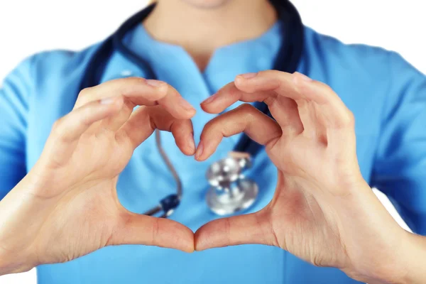 Doctor's hands making heart shape — Stock Photo, Image