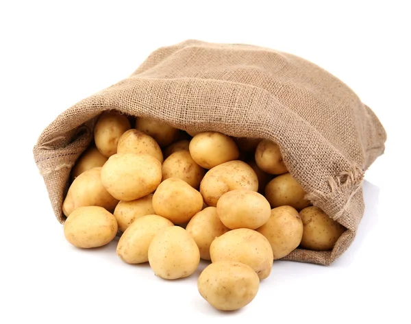 Papas nuevas en saco aislado en blanco — Foto de Stock