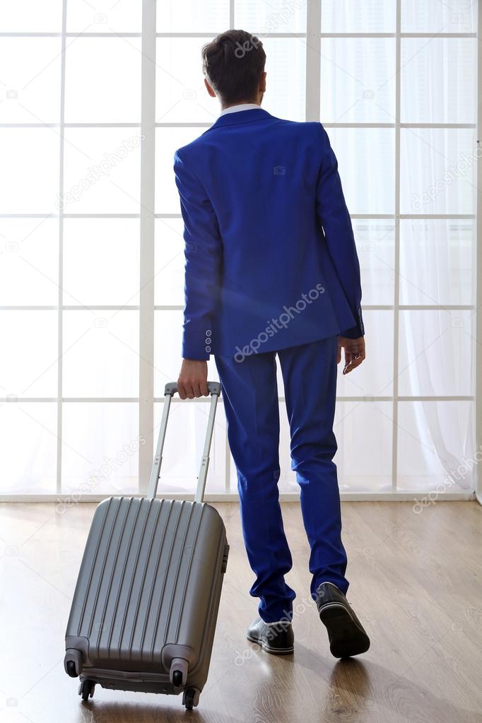 Business man with suitcase 