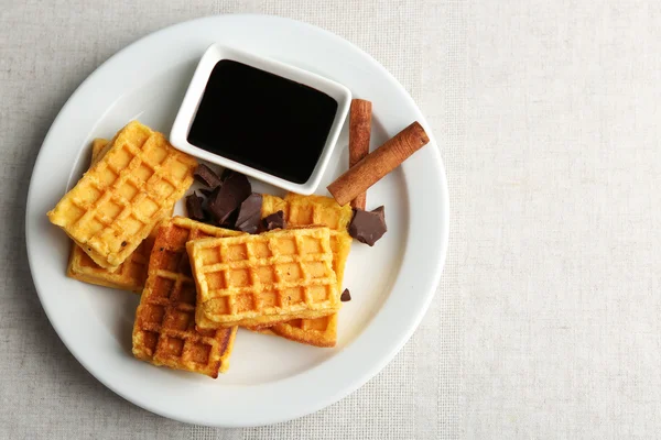 Sweet homemade waffles on plate — Stock Photo, Image