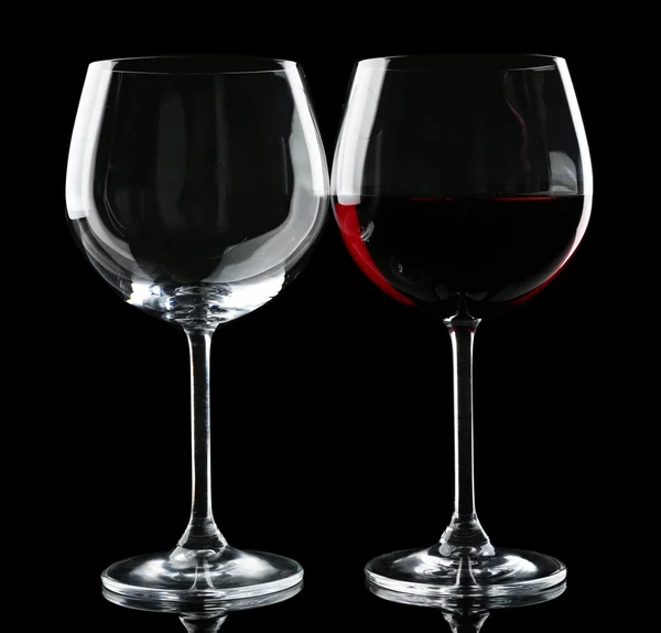 Glasses of wine on black — Stock Photo, Image