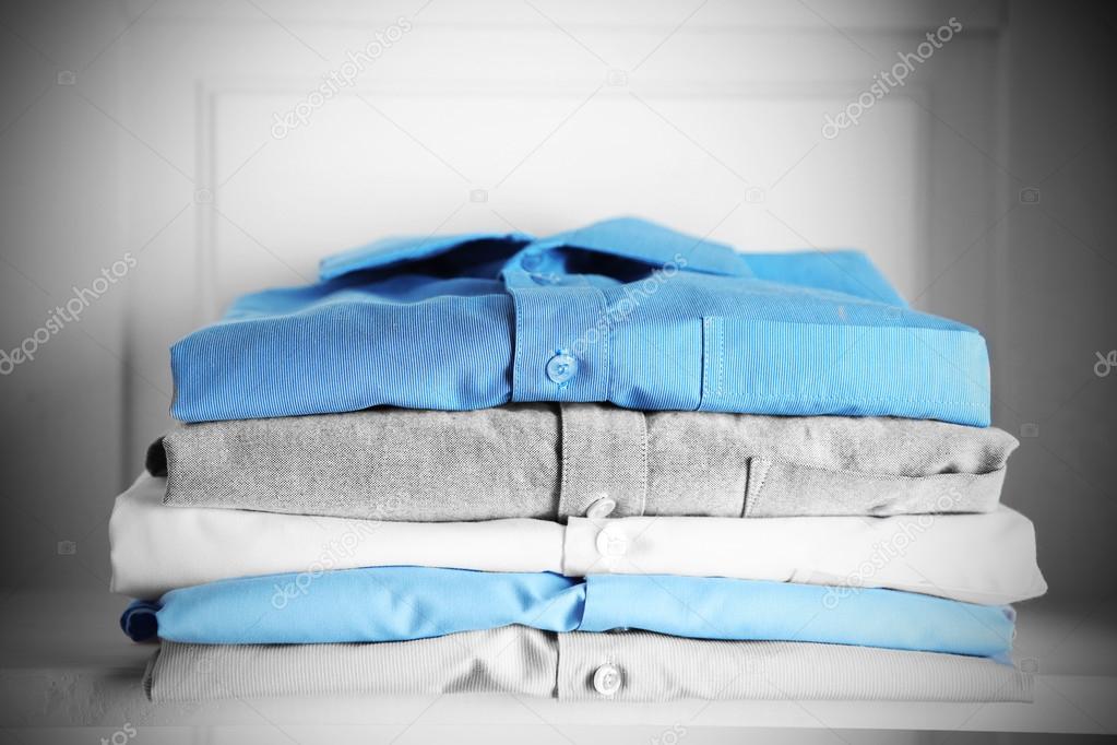 Business shirts on shelf