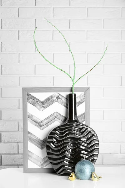 Modern vase with decor on floor in room — Stock Photo, Image