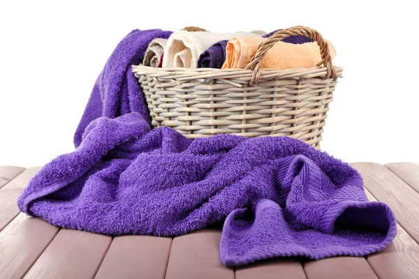 Colorful towels in basket — Stock Photo, Image