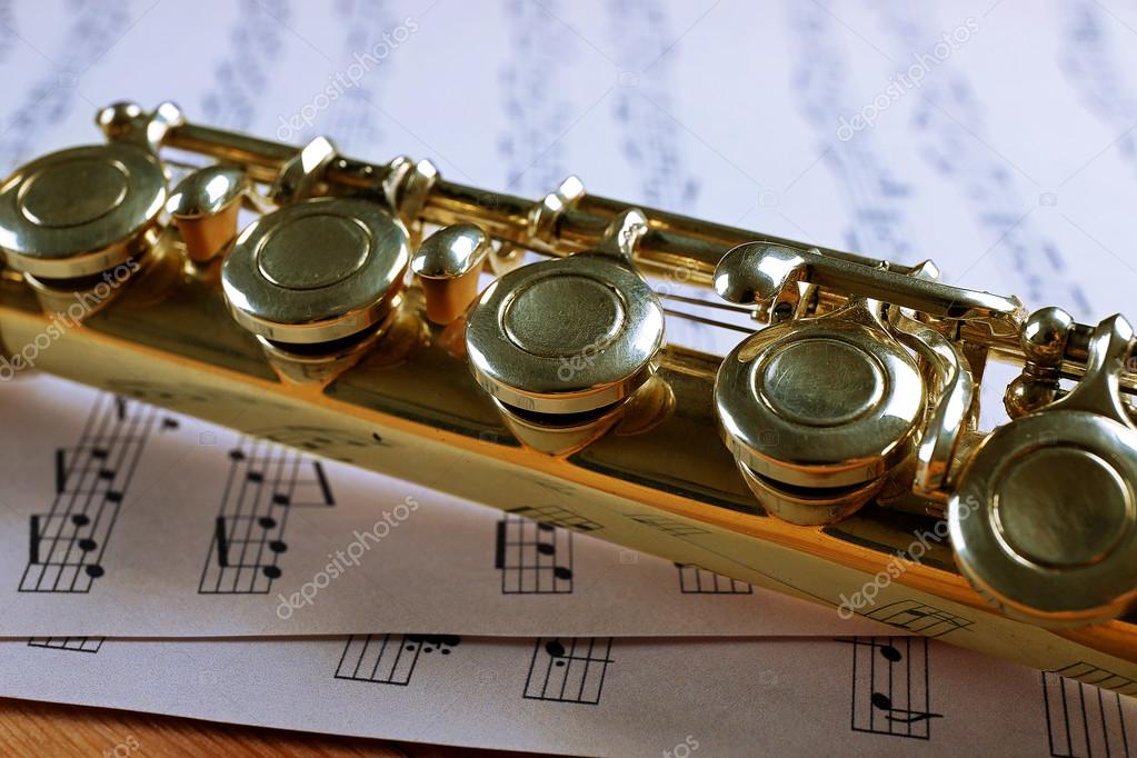 Flute and music notes Stock Photo by ©belchonock 80716312