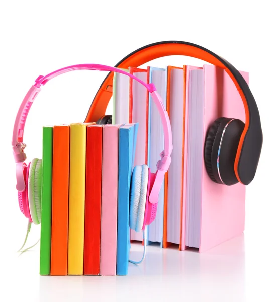 Books and headphones as audio books concept isolated on white — Stock Photo, Image