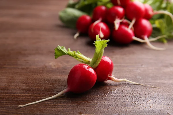 Fresh red radish on wooden background — Stock Photo, Image