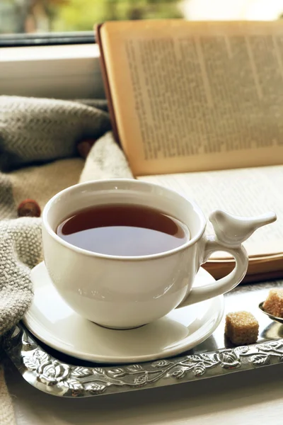 Taza de té con libro — Foto de Stock