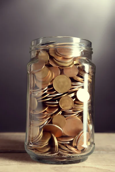 Coins in money jar