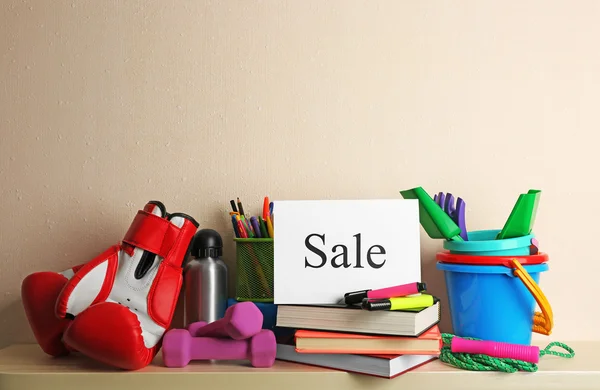 Goods for sale, on light wall background — Stock Photo, Image
