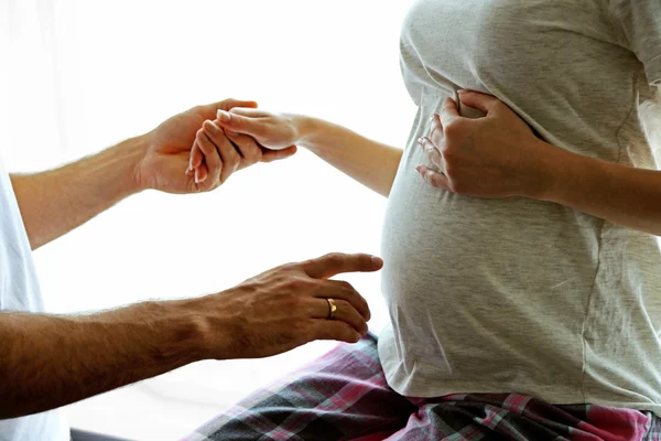 Pregnant woman with husband — Stock Photo, Image