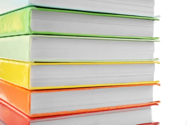 Colorful books close-up on white background — Stock Photo, Image