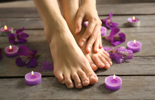 Female feet at spa pedicure procedure — Stock Photo, Image