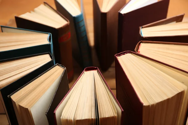 Heart of books, on wooden background — Stock Photo, Image