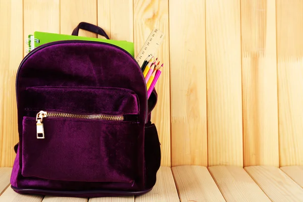 Backpack with school supplies — Stock Photo, Image