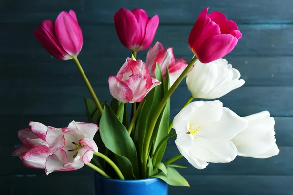 Beautiful tulips on wooden background — Stock Photo, Image