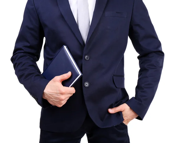 Elegante uomo in giacca e cravatta con blocco note isolato su bianco — Foto Stock