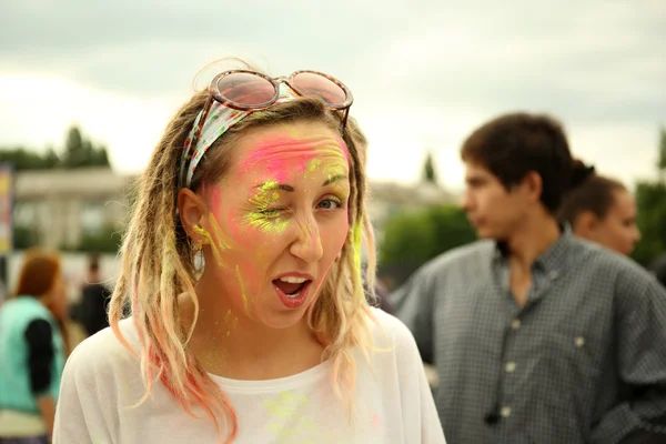 Woman celebrating Holi color festival — Stock Photo, Image