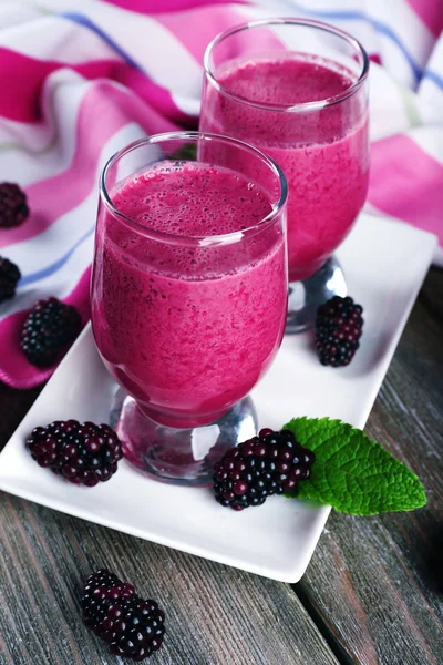 Glasses of blackberry smoothie — Stock Photo, Image