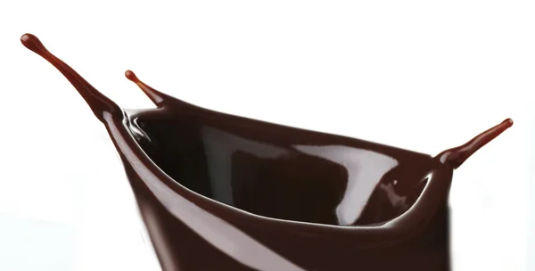 Salpicadura de chocolate caliente en taza — Foto de Stock